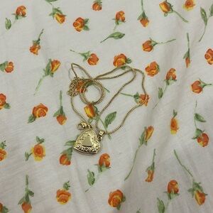 heart pendant gold necklace.